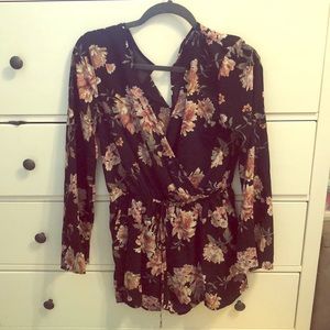 Black long sleeved floral romper